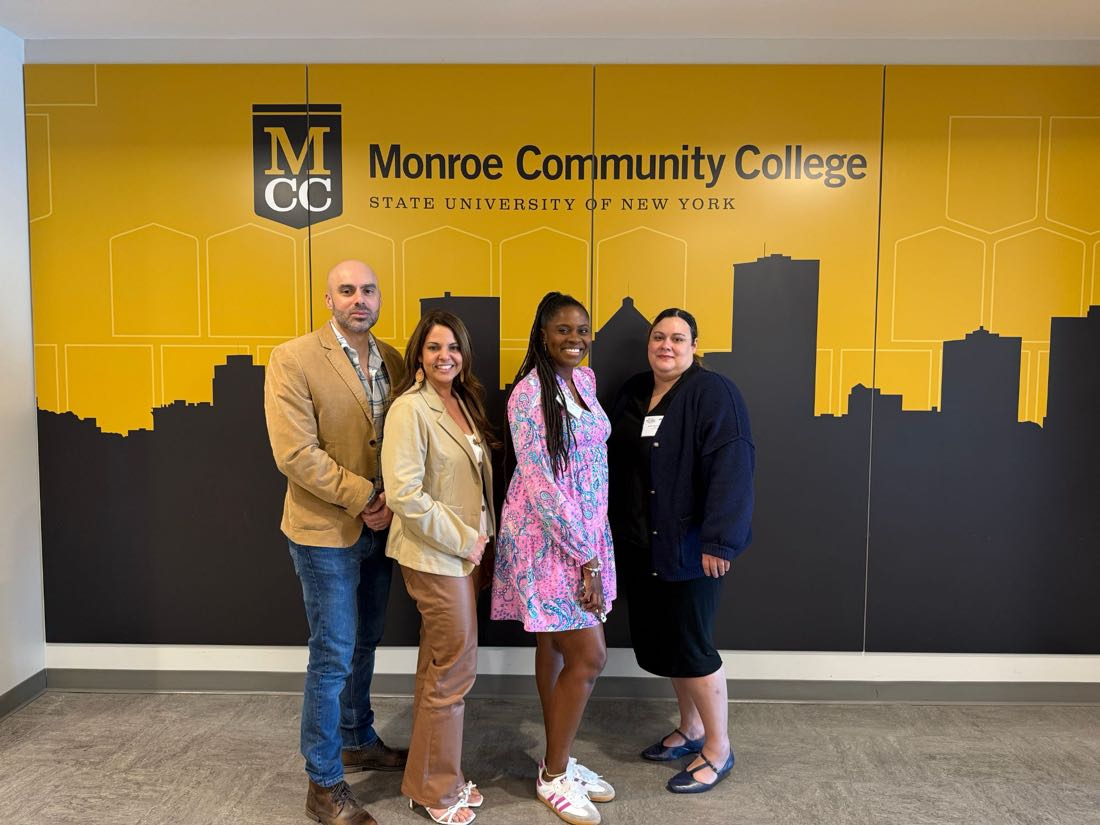 Dr. Jessyca Perez with fellow educators at Monroe Community College